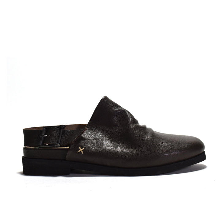 Black leather sandal with a strap on a white background