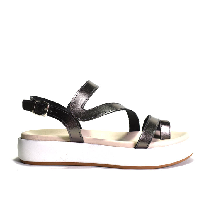 Metallic pewter sandal with a white sole on a white background
