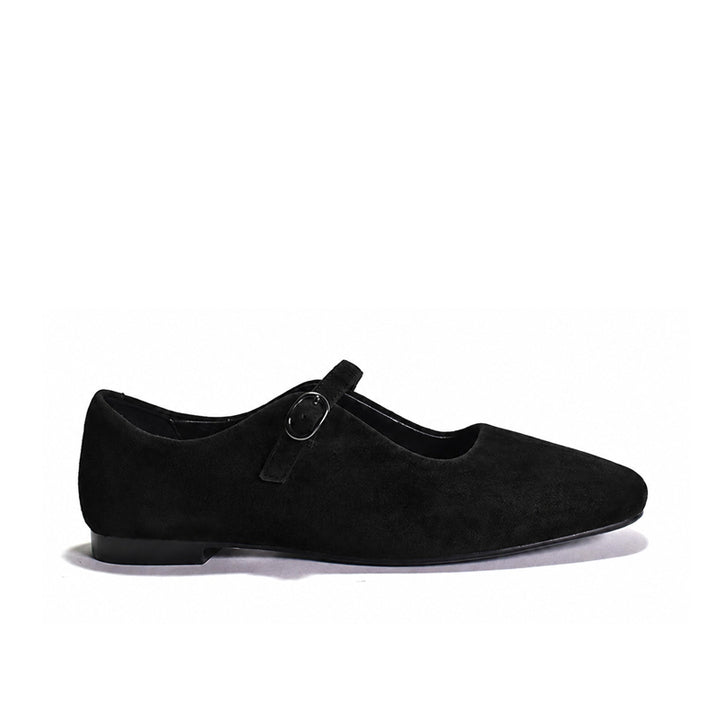Black suede mary-jane shoe on a white background