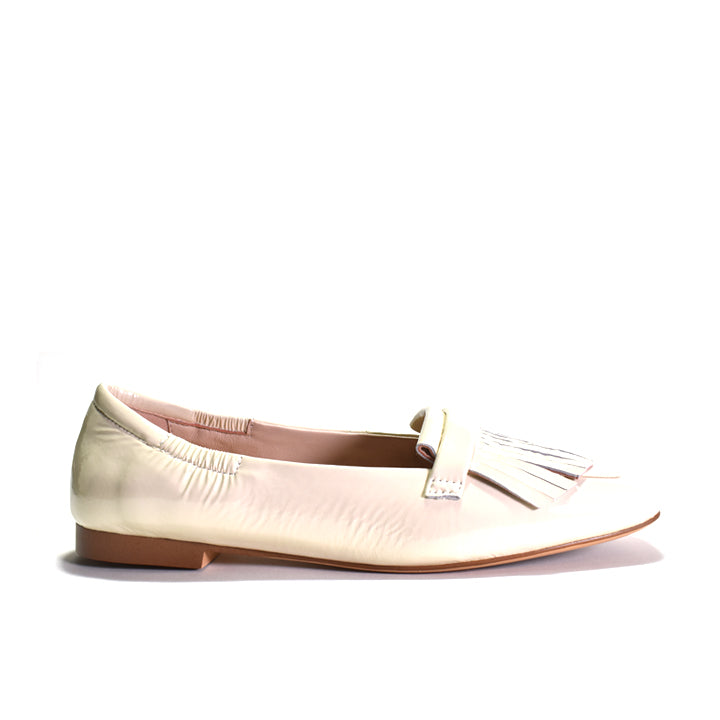 Beige loafer shoe on a white background