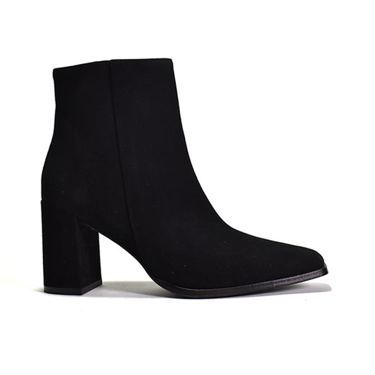 Black ankle boot on a white background