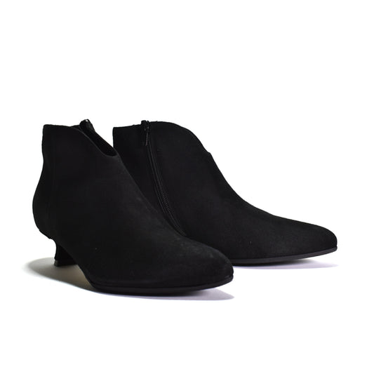 A pair of black suede ankle boots with low kitten heels and side zippers, shown on a clean white background.