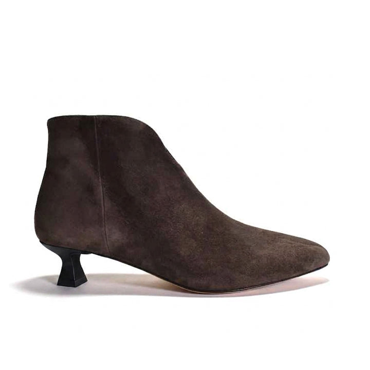 A single dark brown suede ankle boot with a pointed toe and a short black kitten heel, shown in profile against a plain white background.