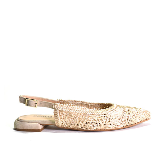 Beige flat shoe with woven design on a white background