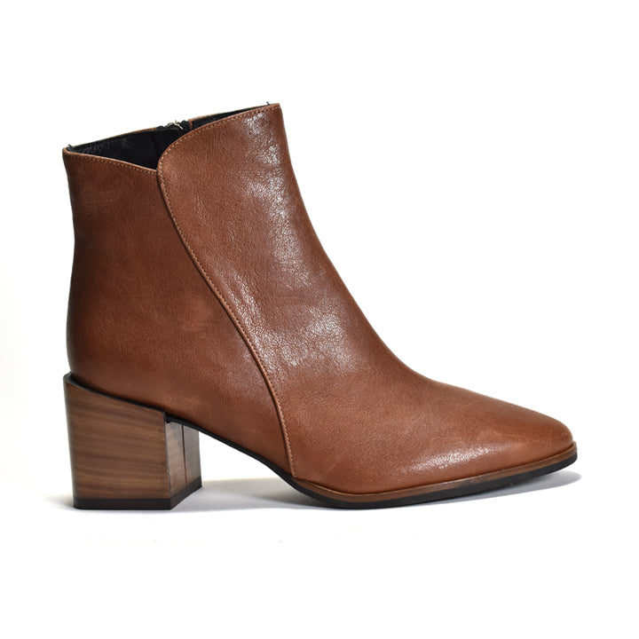Brown leather ankle boot with wooden block heel on a white background