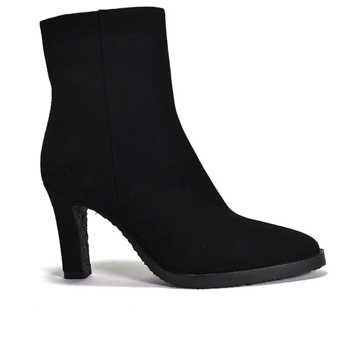 black suede ankle boot with a wrapped tapered heel and outer sole stitch detail.