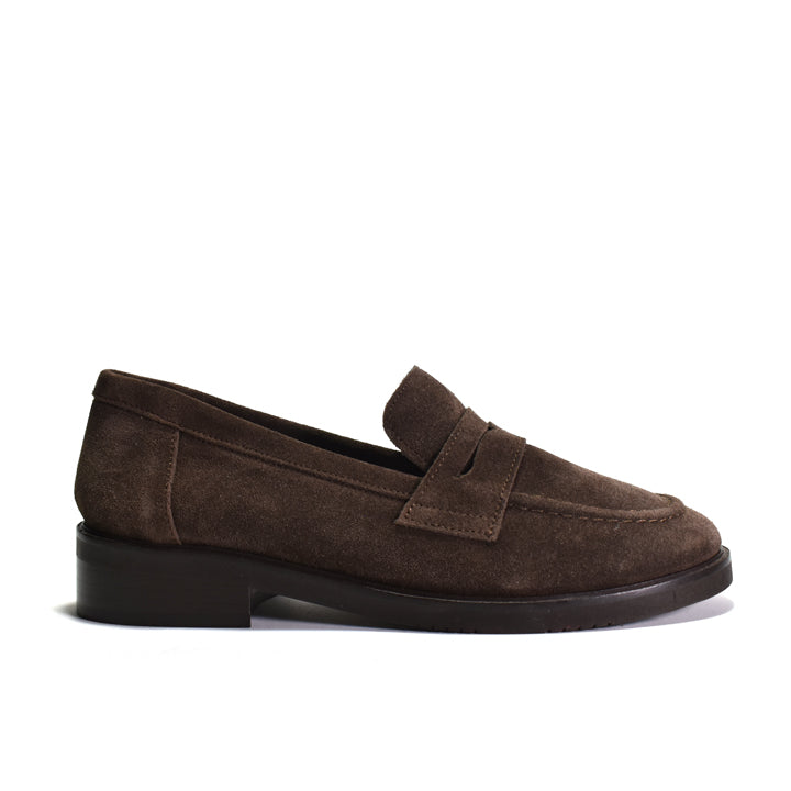 A single dark brown suede penny loafer shown in a side profile view against a plain white background.