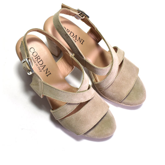 Pair of beige sandals with 'Cordani' branding on a white background
