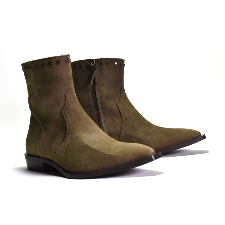 Pair of brown suede boots on a white background