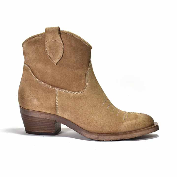 A brown suede western ankle boot with a distressed embroidered toe, an inside zipper, and a low heel, set against a white background.