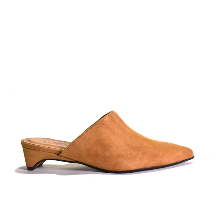 A single tan suede mule shoe with a low block heel and pointed toe, shown in profile against a plain white background.