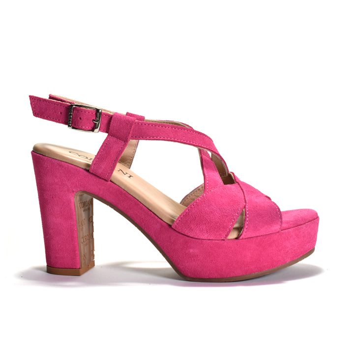Pink high-heeled sandal on a white background
