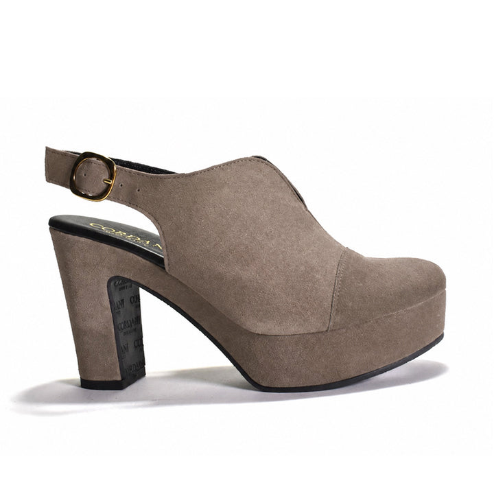 A taupe-brown suede platform slingback shoe with a high block heel, a gold-tone buckle, and black trim, shown from a side profile on a white background.
