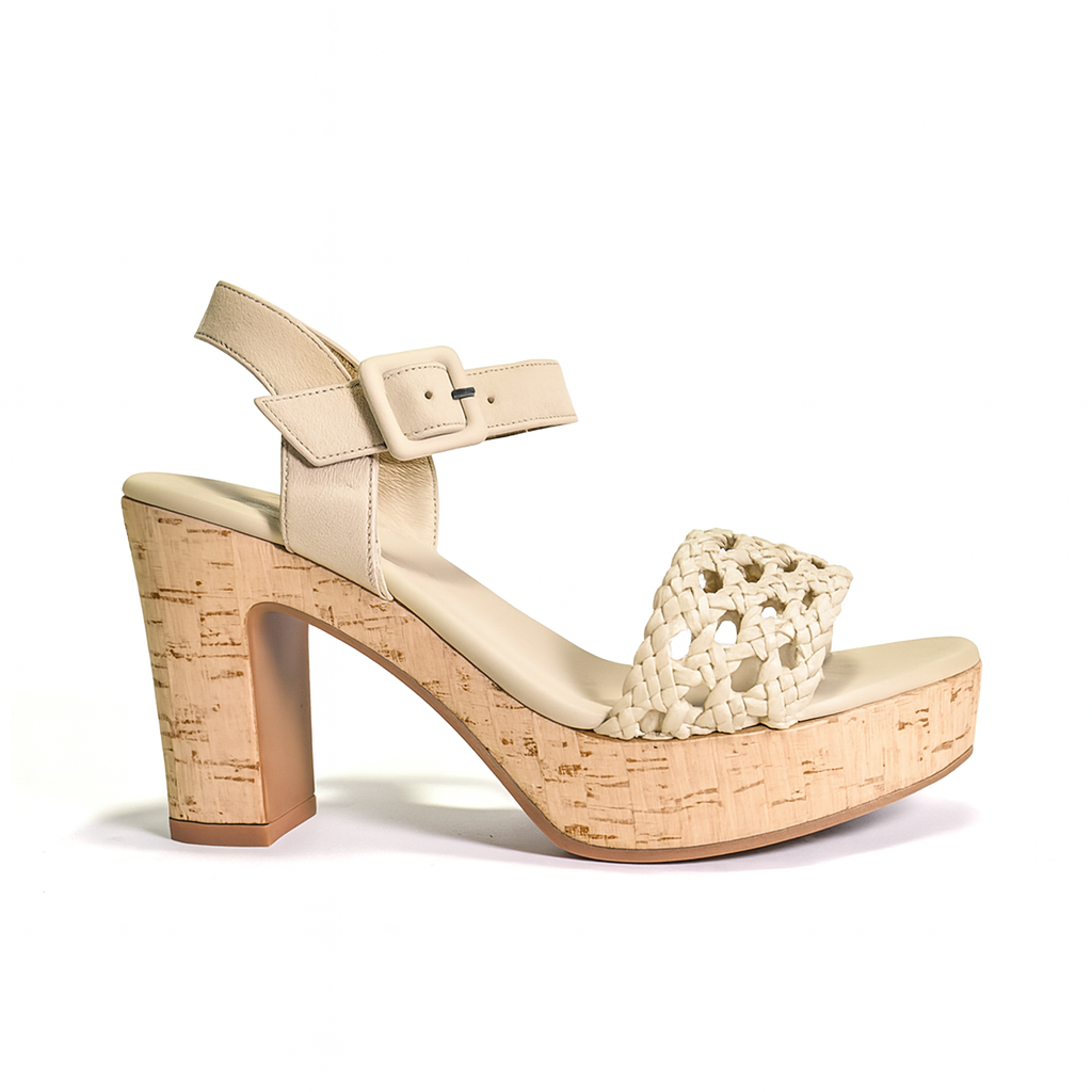 Beige sandal with cork platform and heel on a white background
