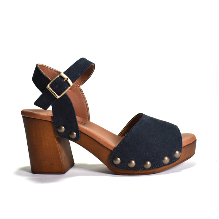Navy sandal with wooden block heel on a white background