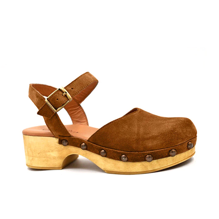 A single brown suede clog sandal with an ankle strap, gold buckle, and a light wood platform sole with metal studs, shown against a plain white background.
