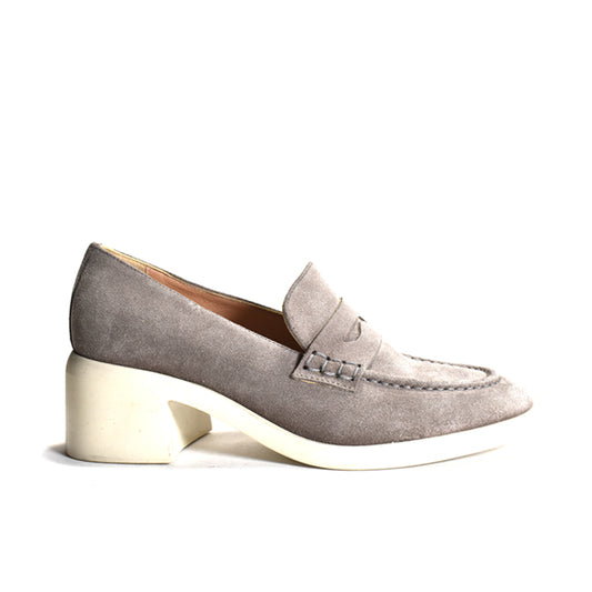 Gray suede loafer with a white sole on a white background