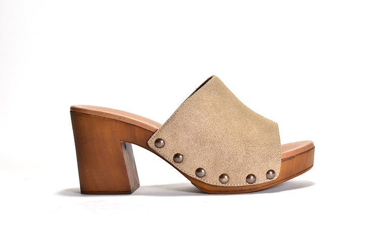 white suede Slip on sandal with stud detail on wood-like platform