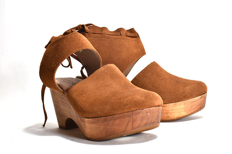 pair of Clogs with brown suede upper and back tie.