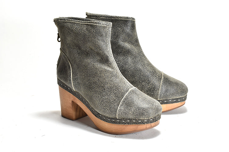 Pull on grey ankle bootie with faux fur lining and wood heel